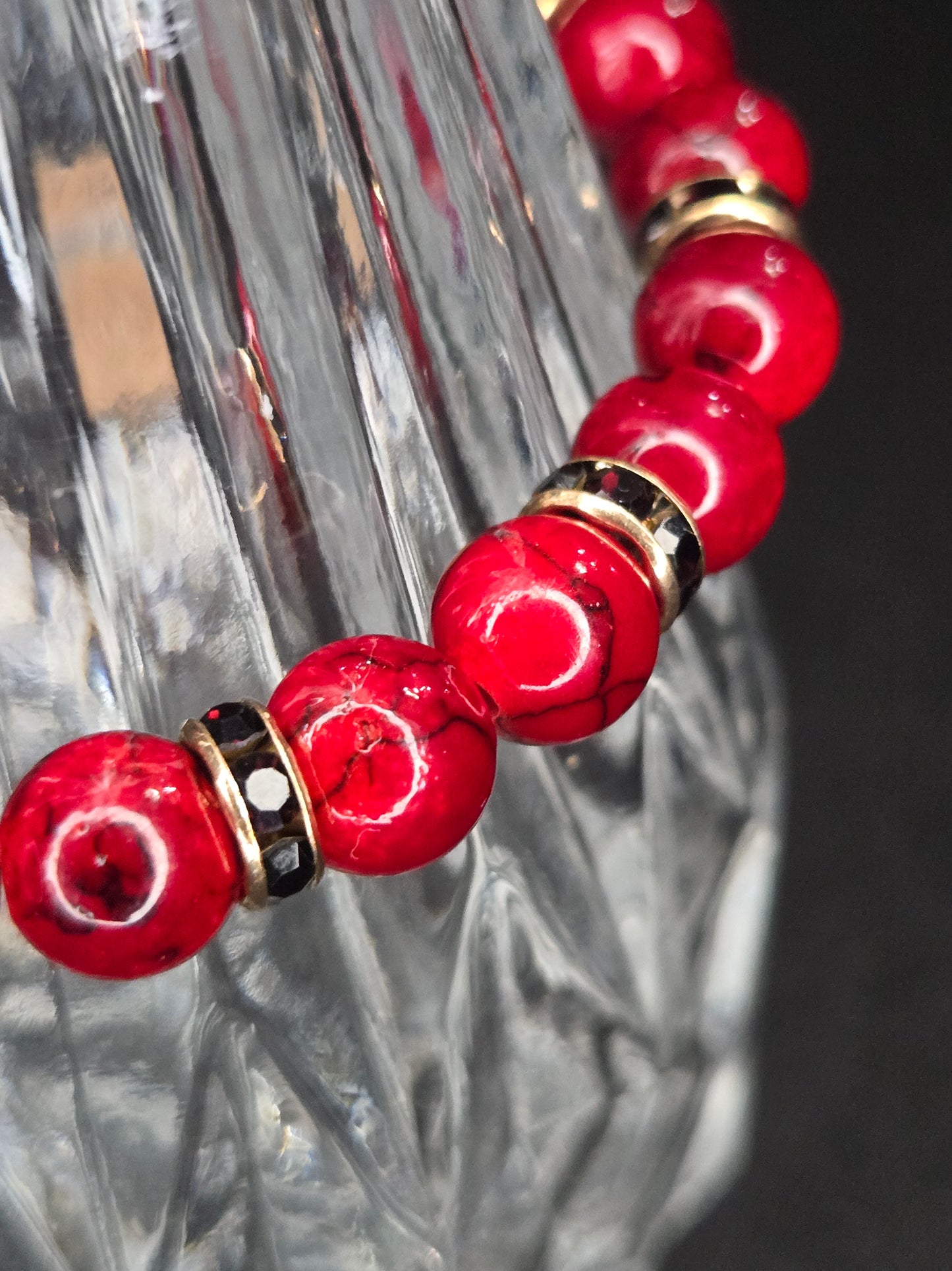 Crimson Glow Stretch Bracelet with Black Crystal Spacers