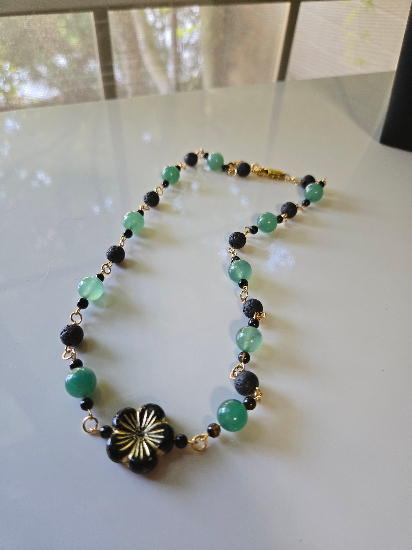 Emerald Eclipse Necklace — Aventurine & Lava Stone with Gold Bloom Accent