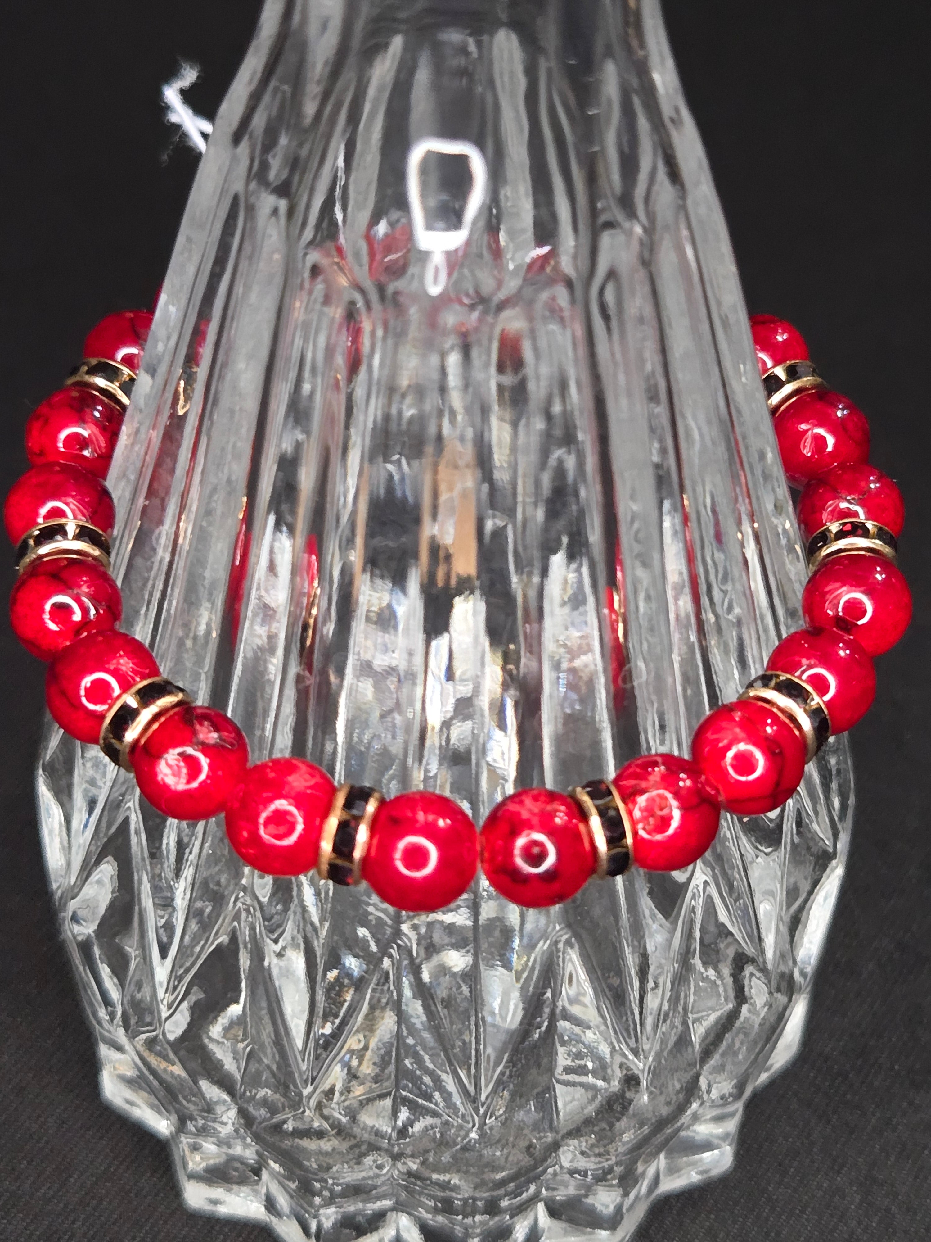 Crimson Glow Stretch Bracelet with Black Crystal Spacers